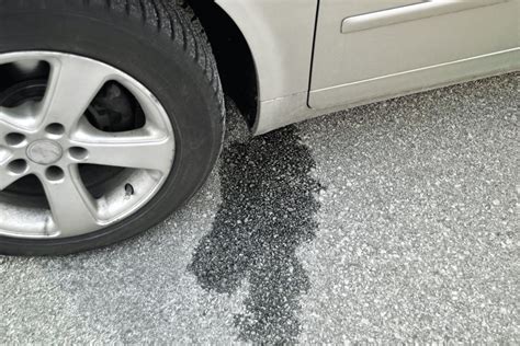 brown oil leaking from car|Identify Car Fluid Leaks: A Color